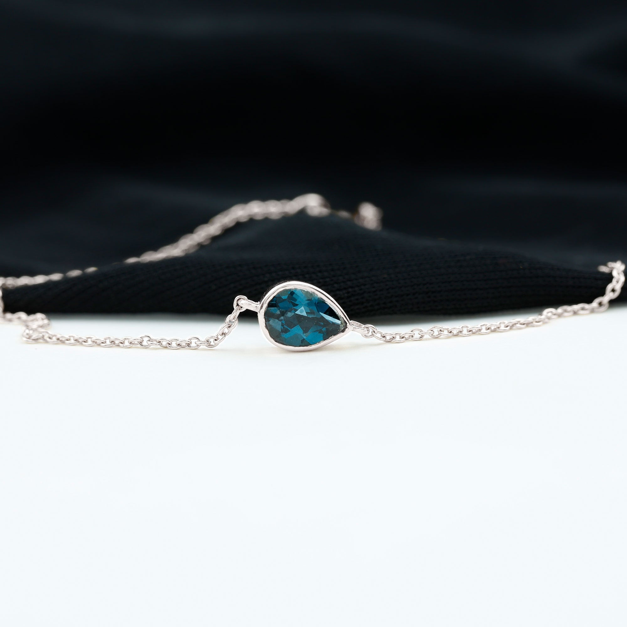 5X7MM Pear Cut London Blue Topaz Solitaire Chain Bracelet
