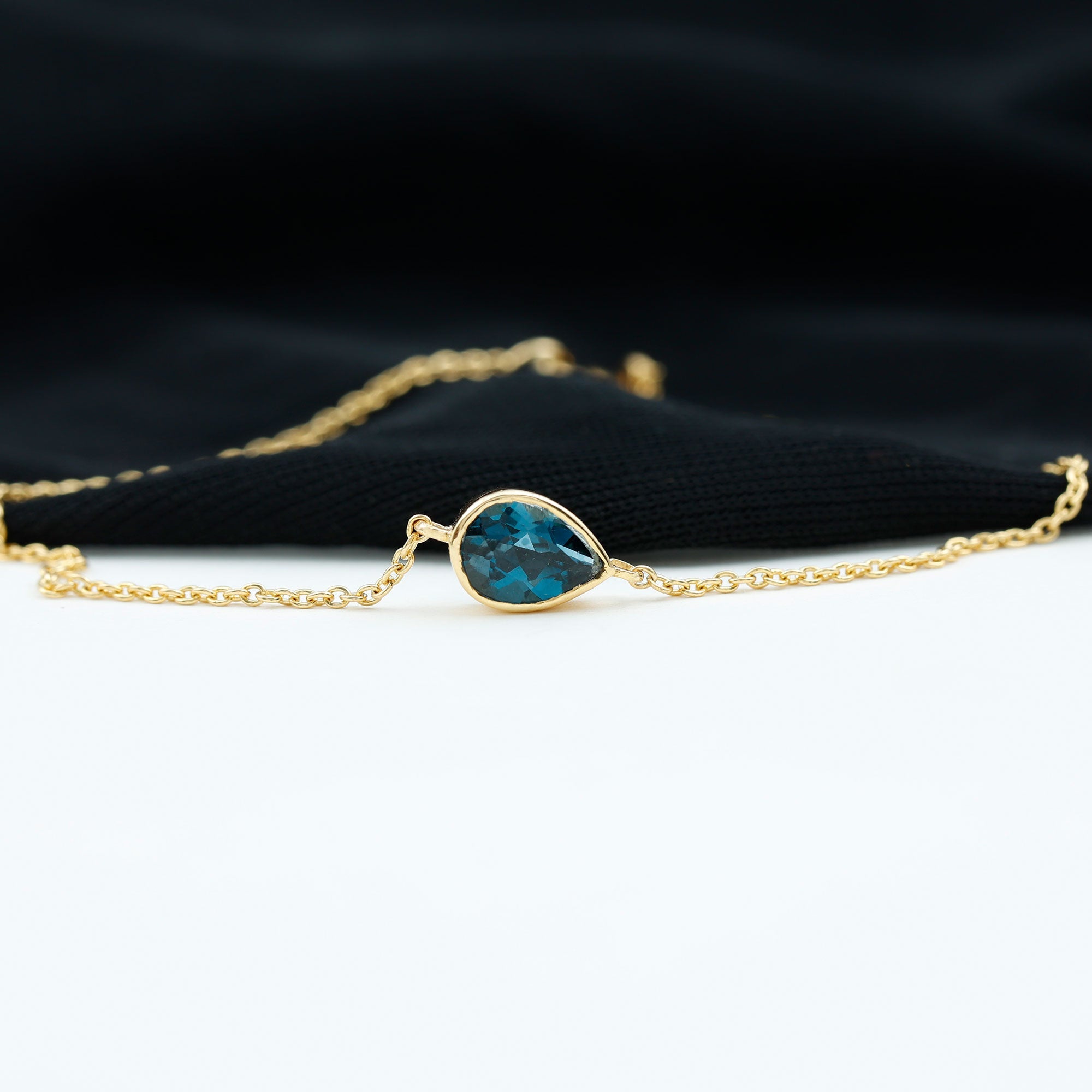 5X7MM Pear Cut London Blue Topaz Solitaire Chain Bracelet