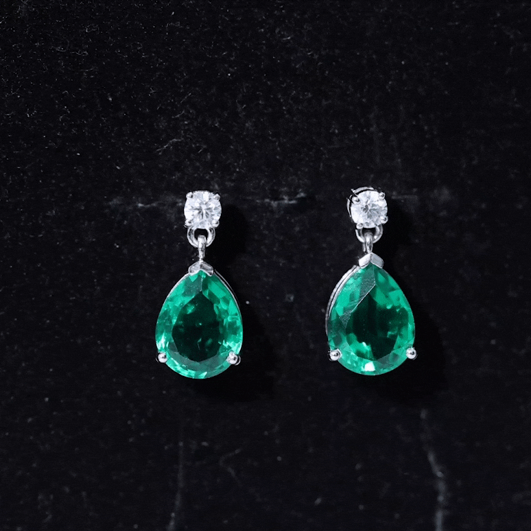 Pear Cut Created Emerald Teardrop Earrings with Moissanite