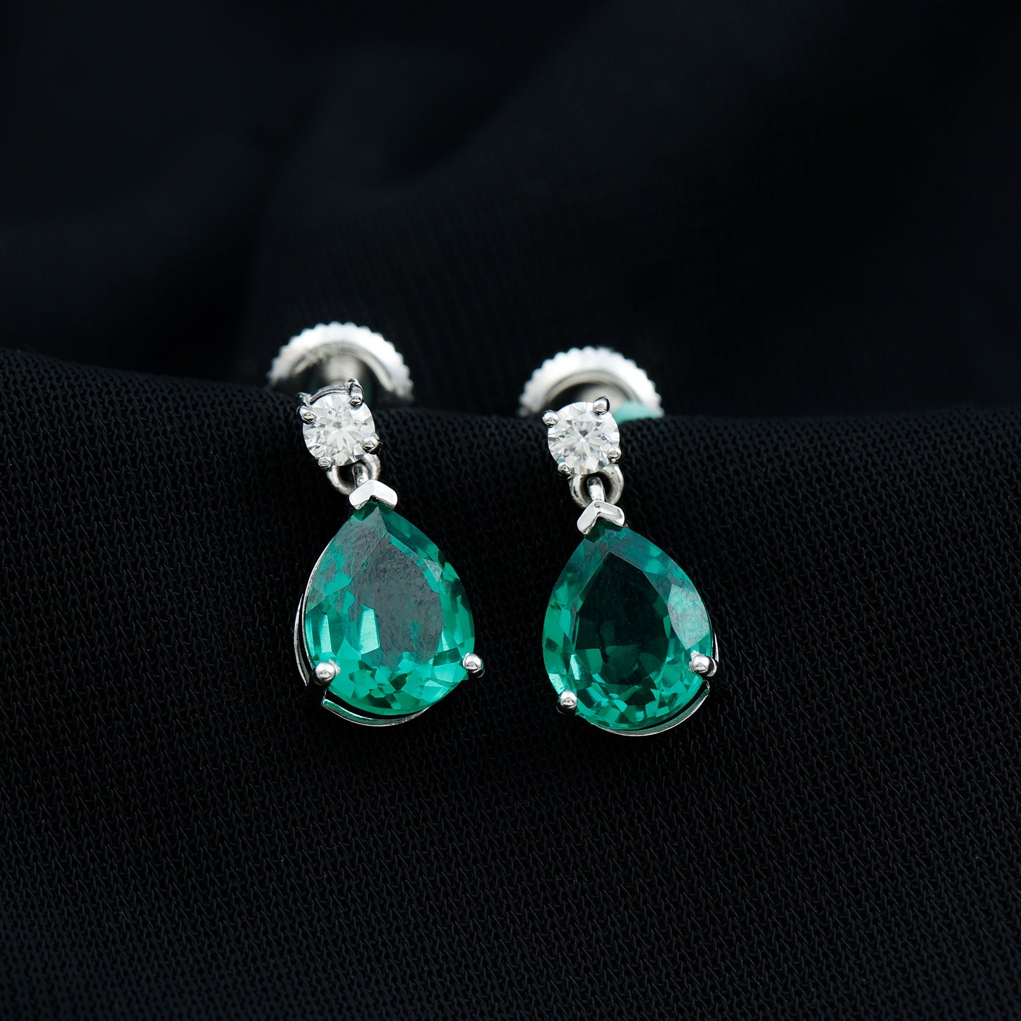 Pear Cut Created Emerald Teardrop Earrings with Moissanite