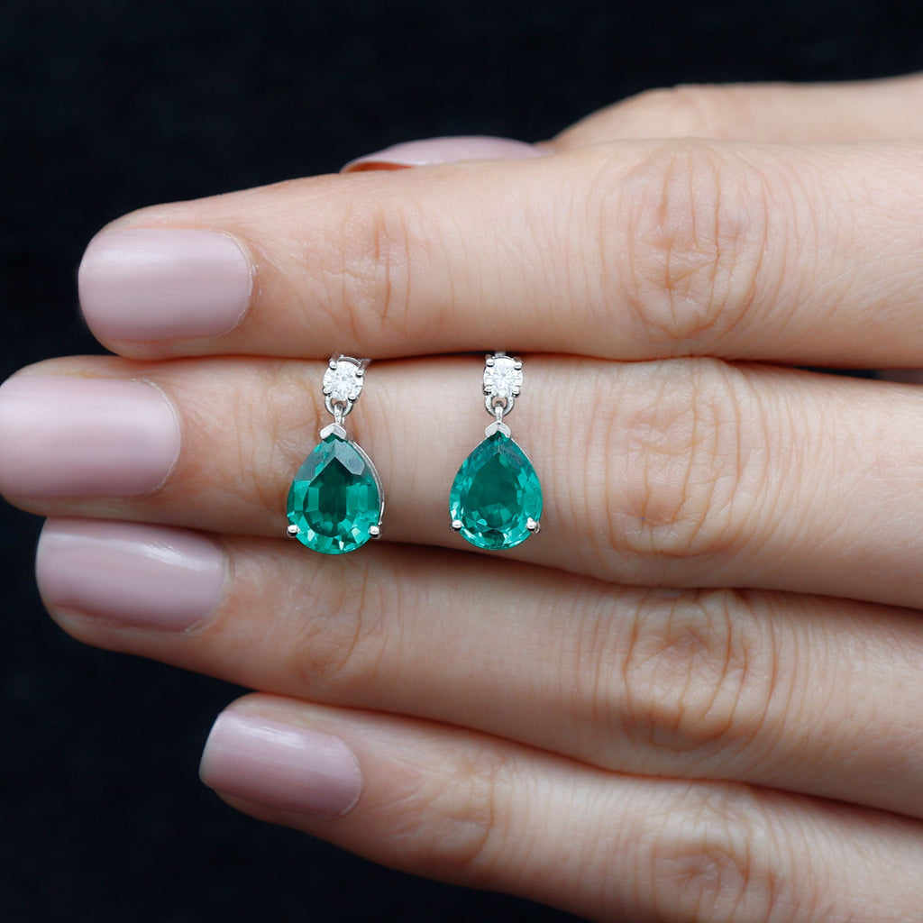 Pear Cut Created Emerald Teardrop Earrings with Moissanite
