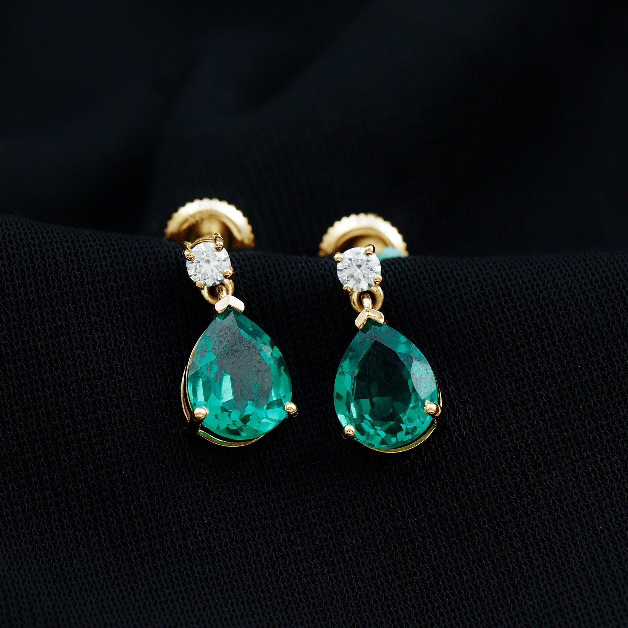 Pear Cut Created Emerald Teardrop Earrings with Moissanite