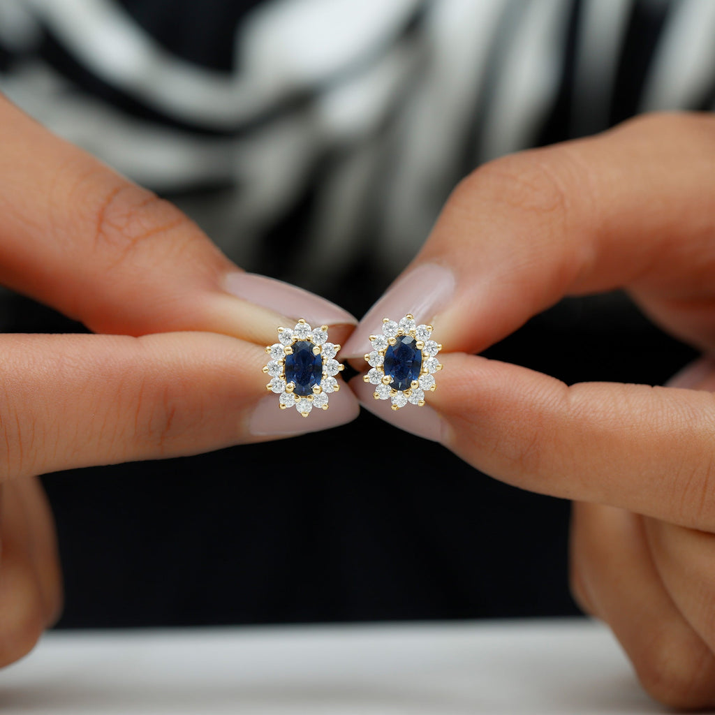 Oval Shaped Lab Grown Blue Sapphire and Diamond Halo Stud Earrings