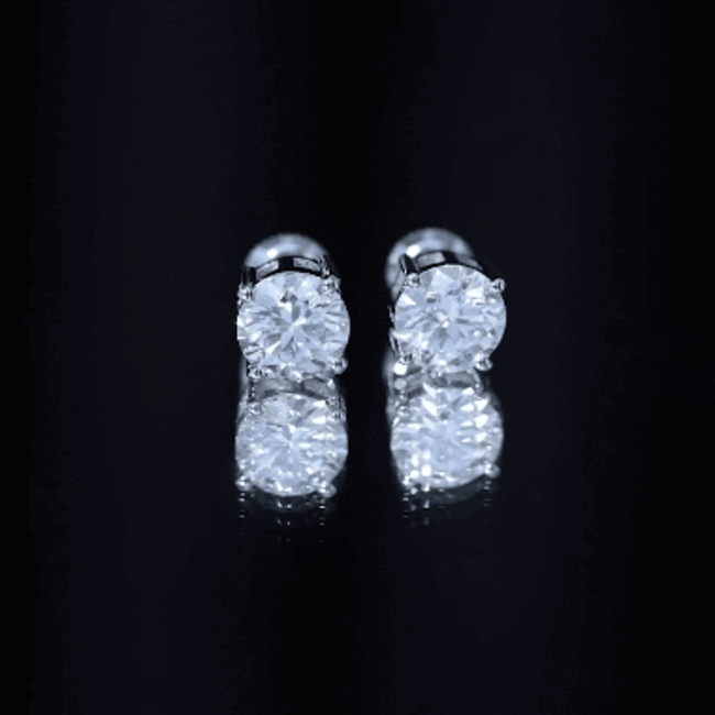 2.5 Carat Round Moissanite Studs in Claw Setting