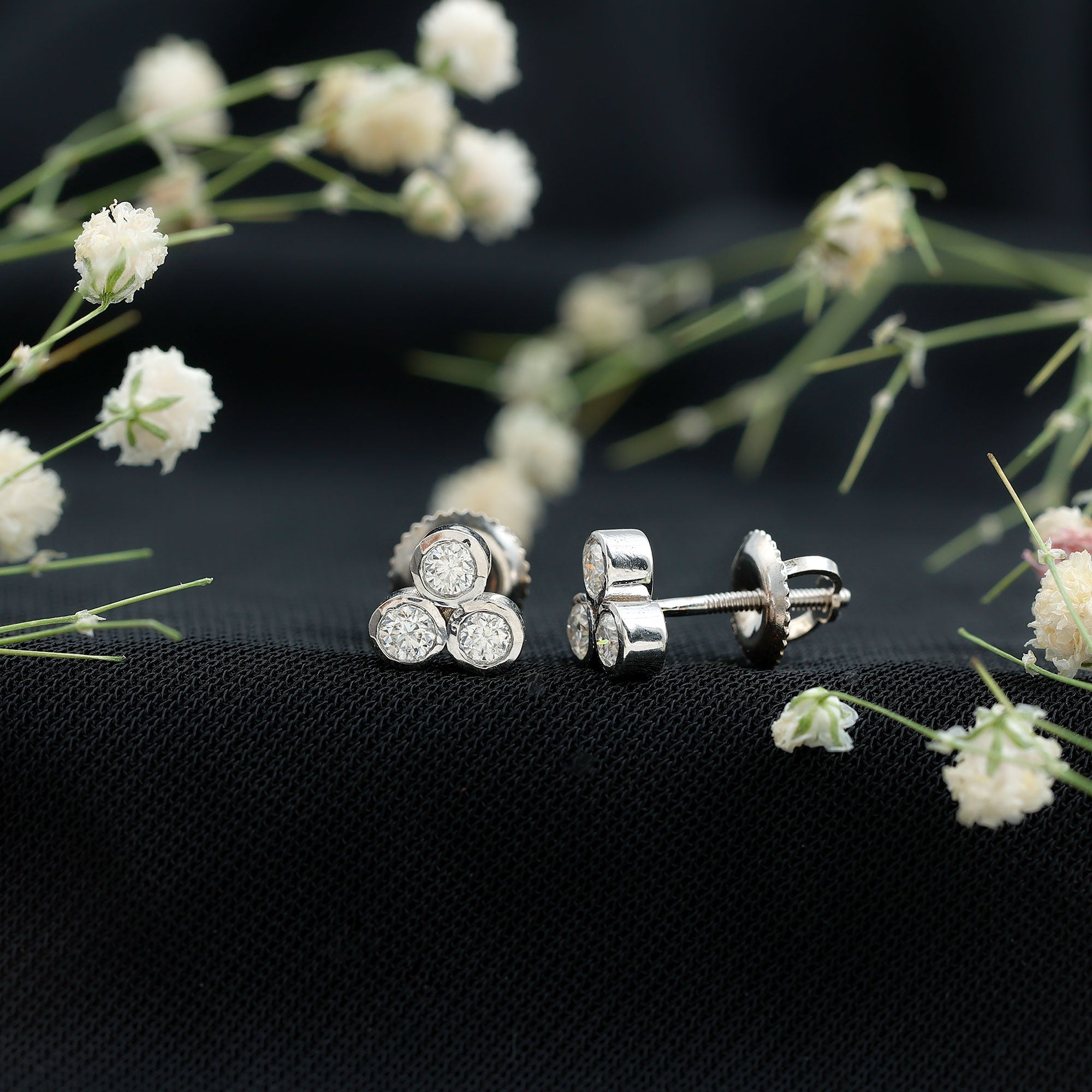 Bezel Set Round Cut Moissanite Three Stone Stud Earrings