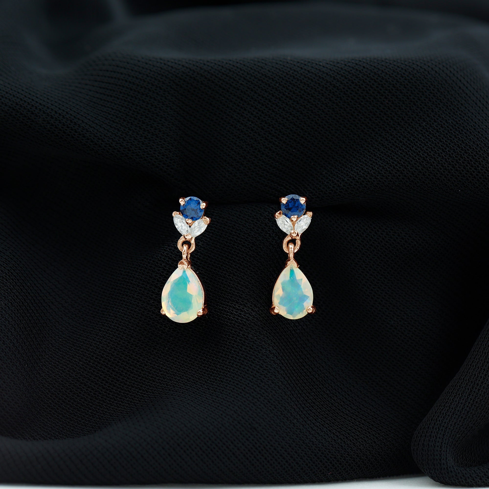 Ethiopian Opal and Created Blue Sapphire Dangle Earrings with Moissanite