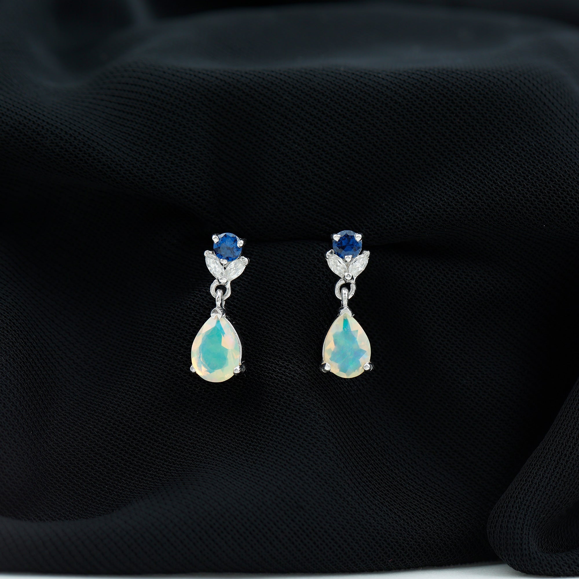 Ethiopian Opal and Created Blue Sapphire Dangle Earrings with Moissanite