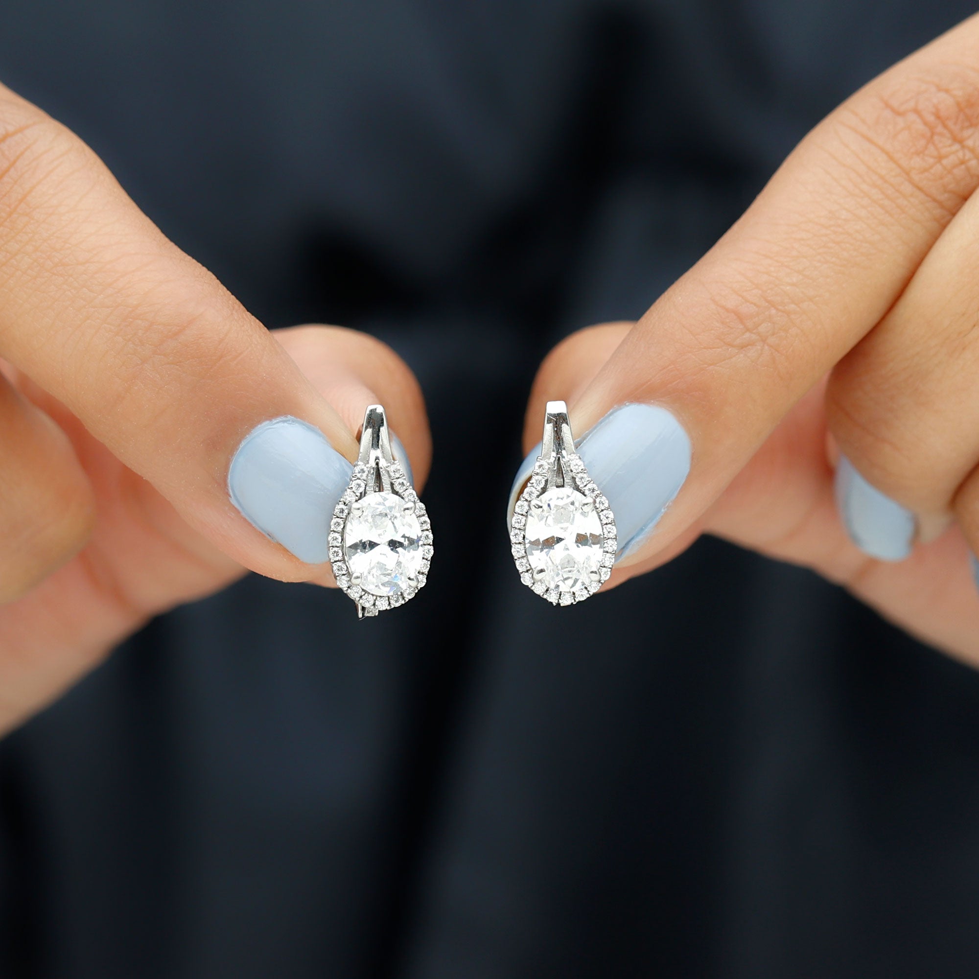 Oval Shaped 6X8 MM Moissanite Designer Earrings in Silver