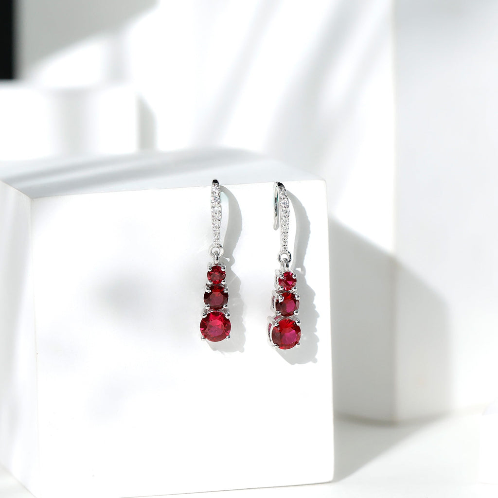 2.50 CT Lab Created Ruby Three Stone Dangle Earrings with Moissanite