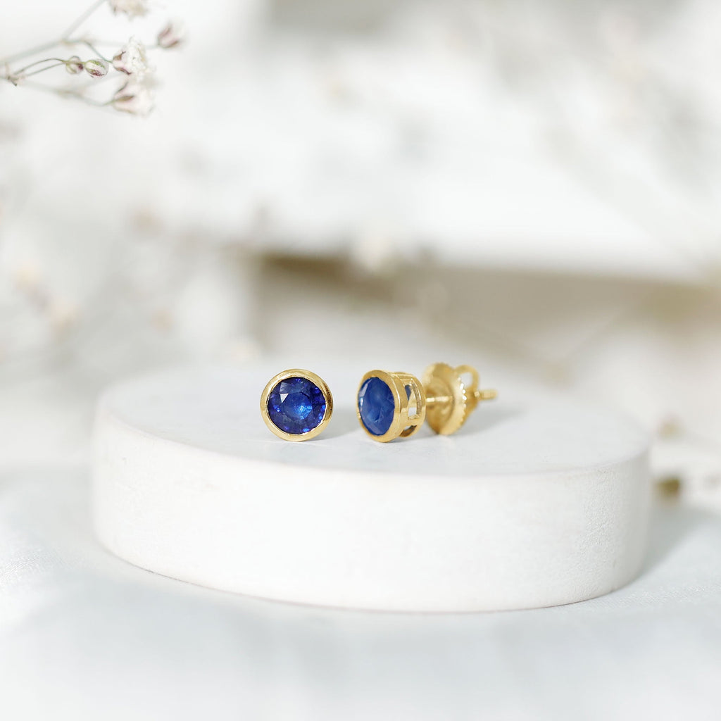 3/4 CT Bezel Set Blue Sapphire Solitaire Stud Earrings in Gold