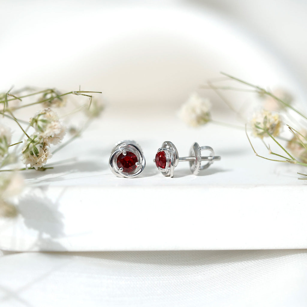 Solitaire Created Ruby Swirl Stud Earrings in 3 Prong Setting
