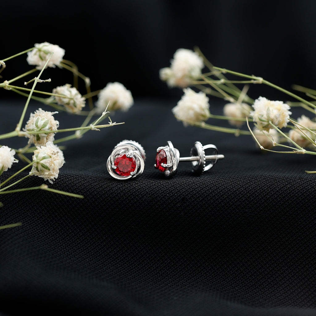 Solitaire Created Ruby Swirl Stud Earrings in 3 Prong Setting