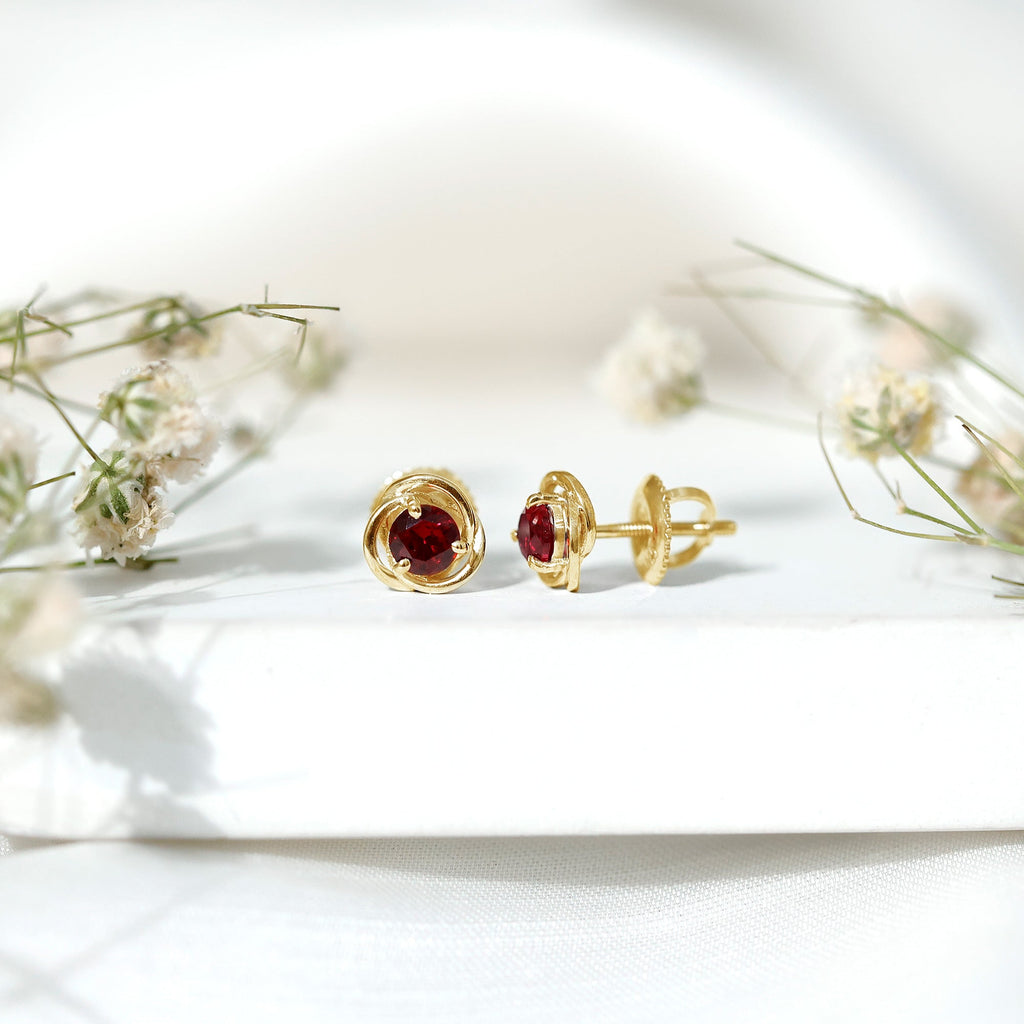 Solitaire Created Ruby Swirl Stud Earrings in 3 Prong Setting