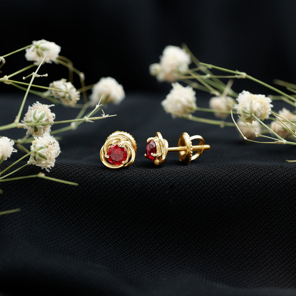 Solitaire Created Ruby Swirl Stud Earrings in 3 Prong Setting