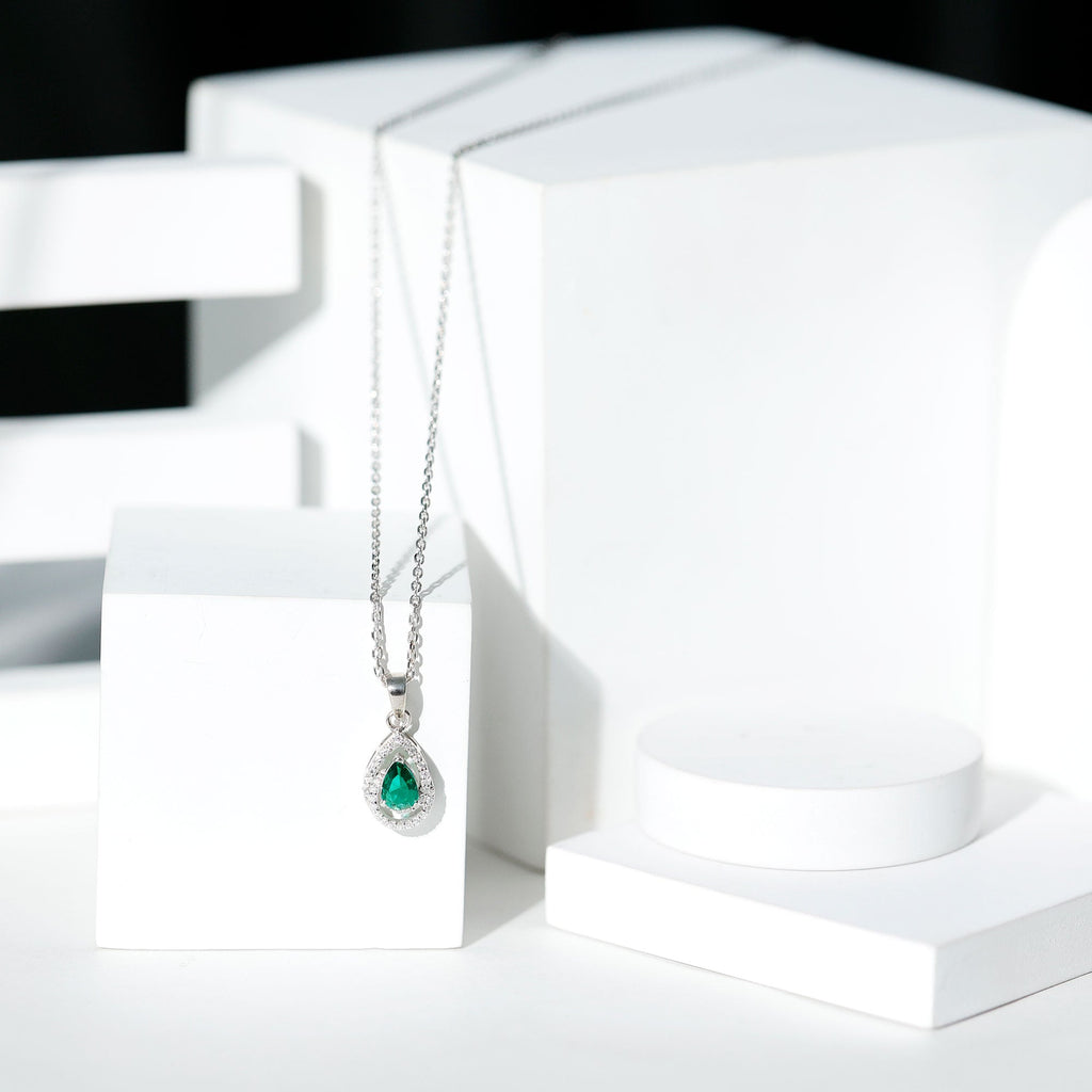 Sterling Silver 0.7 Carat Lab Grown Emerald Teardrop Pendant Necklace with Moissanite