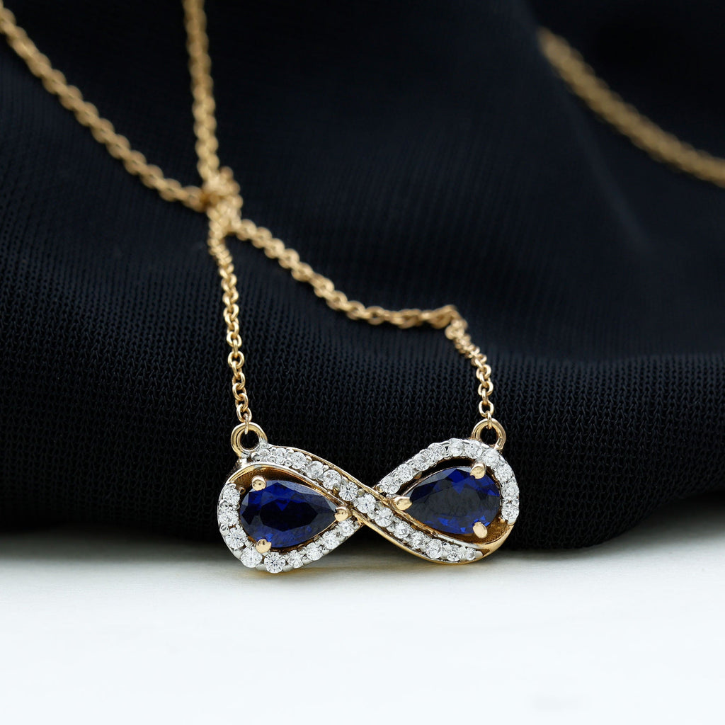 Lab Grown Blue Sapphire Infinity Necklace With Diamond Accent
