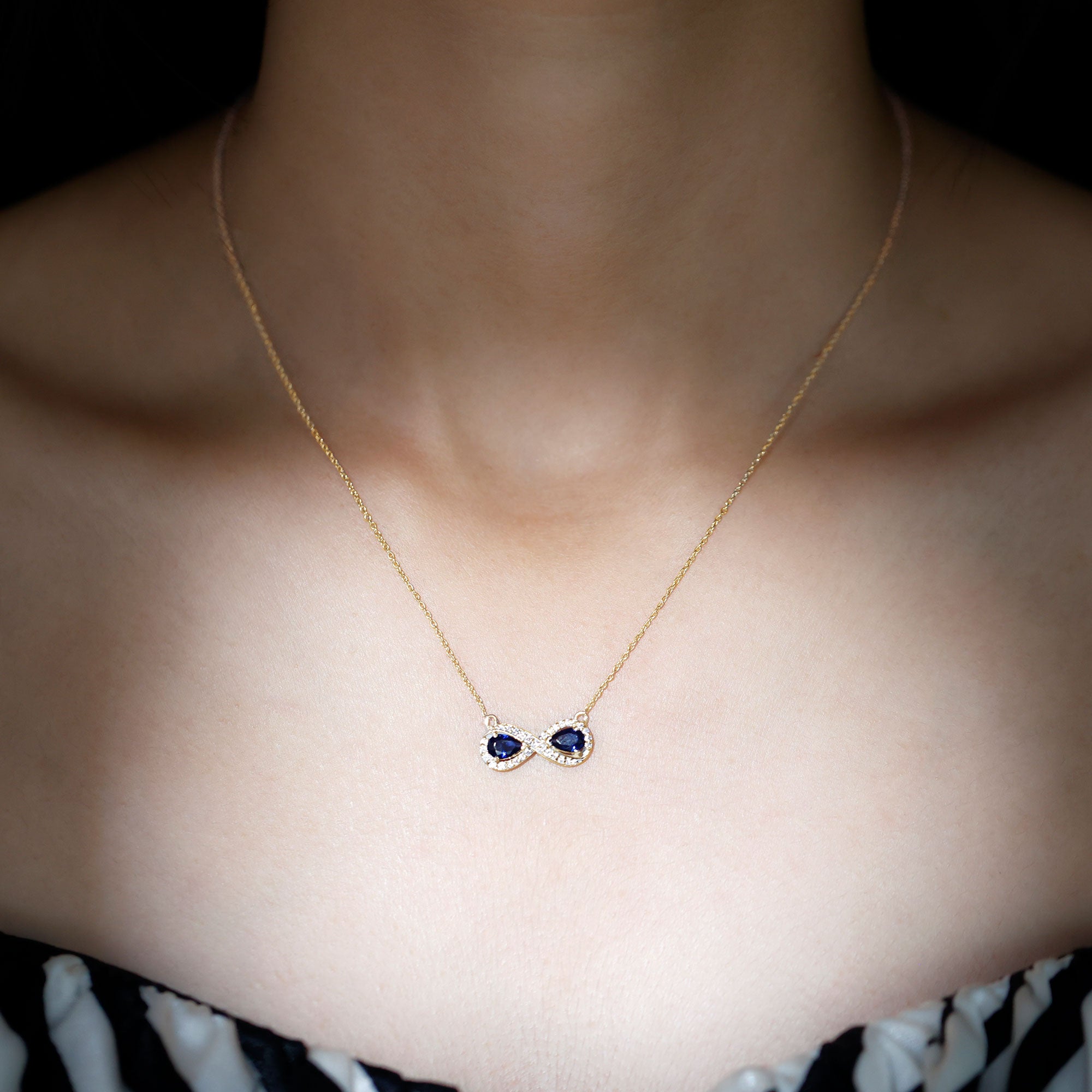 Lab Grown Blue Sapphire Infinity Necklace With Diamond Accent