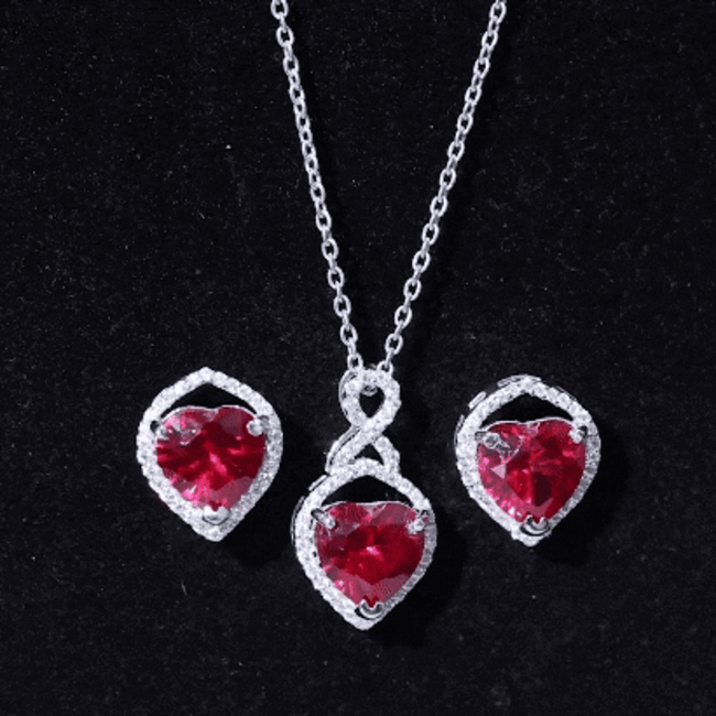 Heart Shape Created Ruby and Moissanite Infinity Pendant Earrings Set