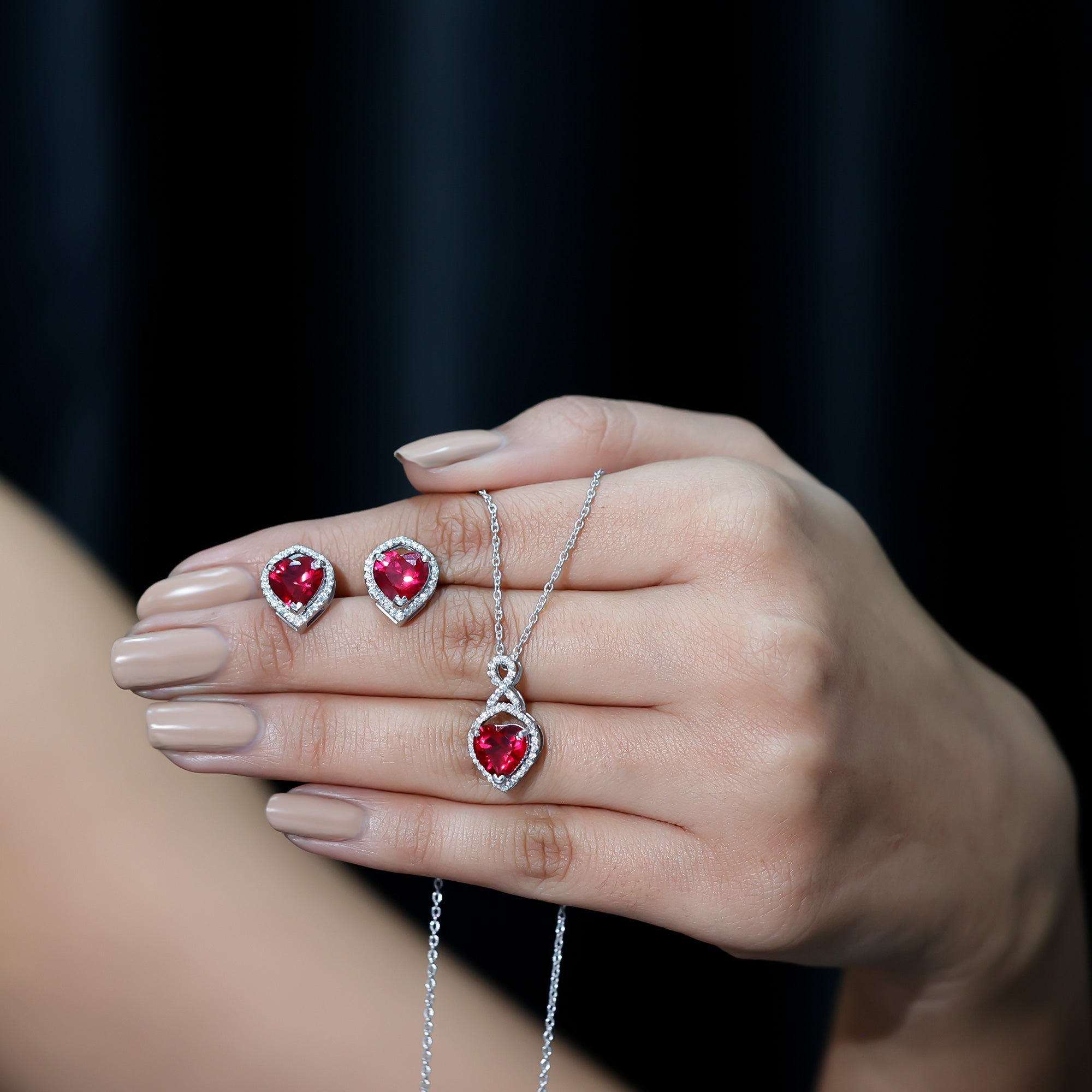 Heart Shape Created Ruby and Moissanite Infinity Pendant Earrings Set