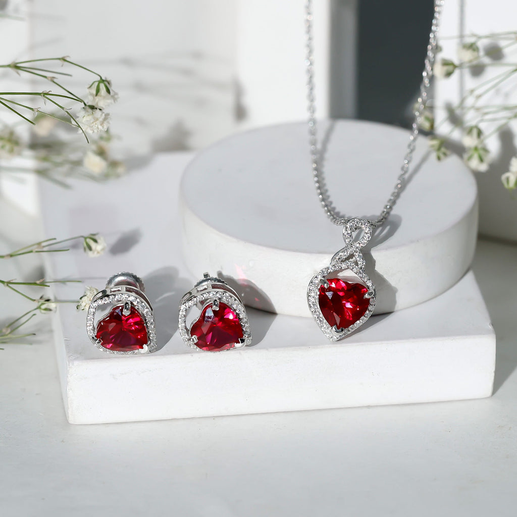 Heart Shape Created Ruby and Moissanite Infinity Pendant Earrings Set