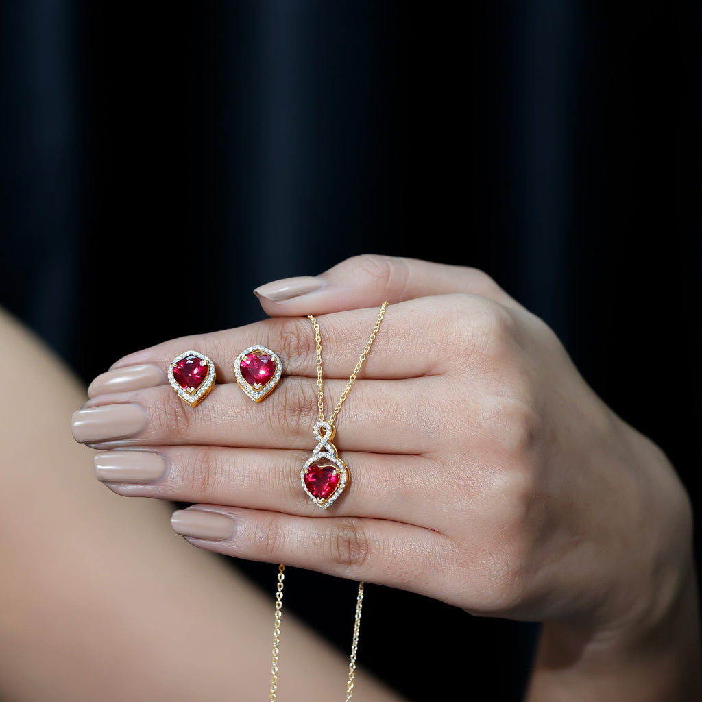 Heart Shape Created Ruby and Moissanite Infinity Pendant Earrings Set