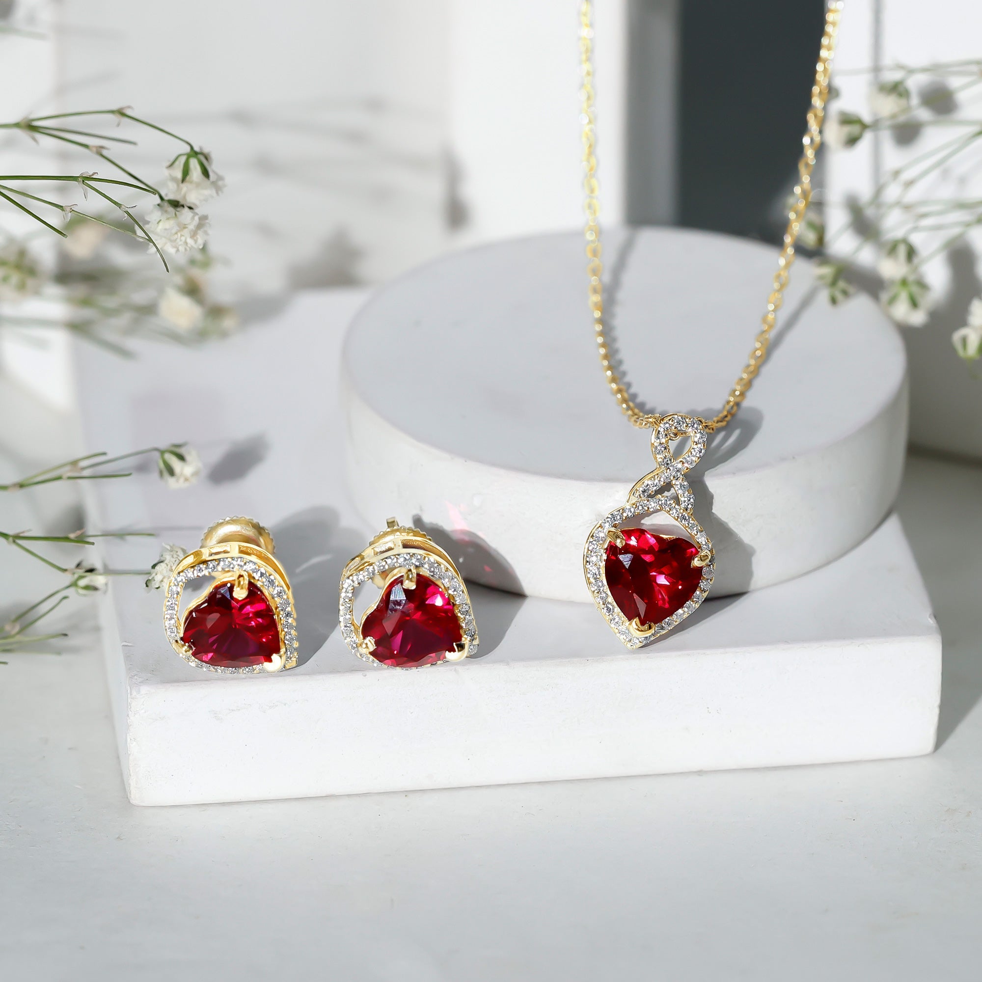 Heart Shape Created Ruby and Moissanite Infinity Pendant Earrings Set