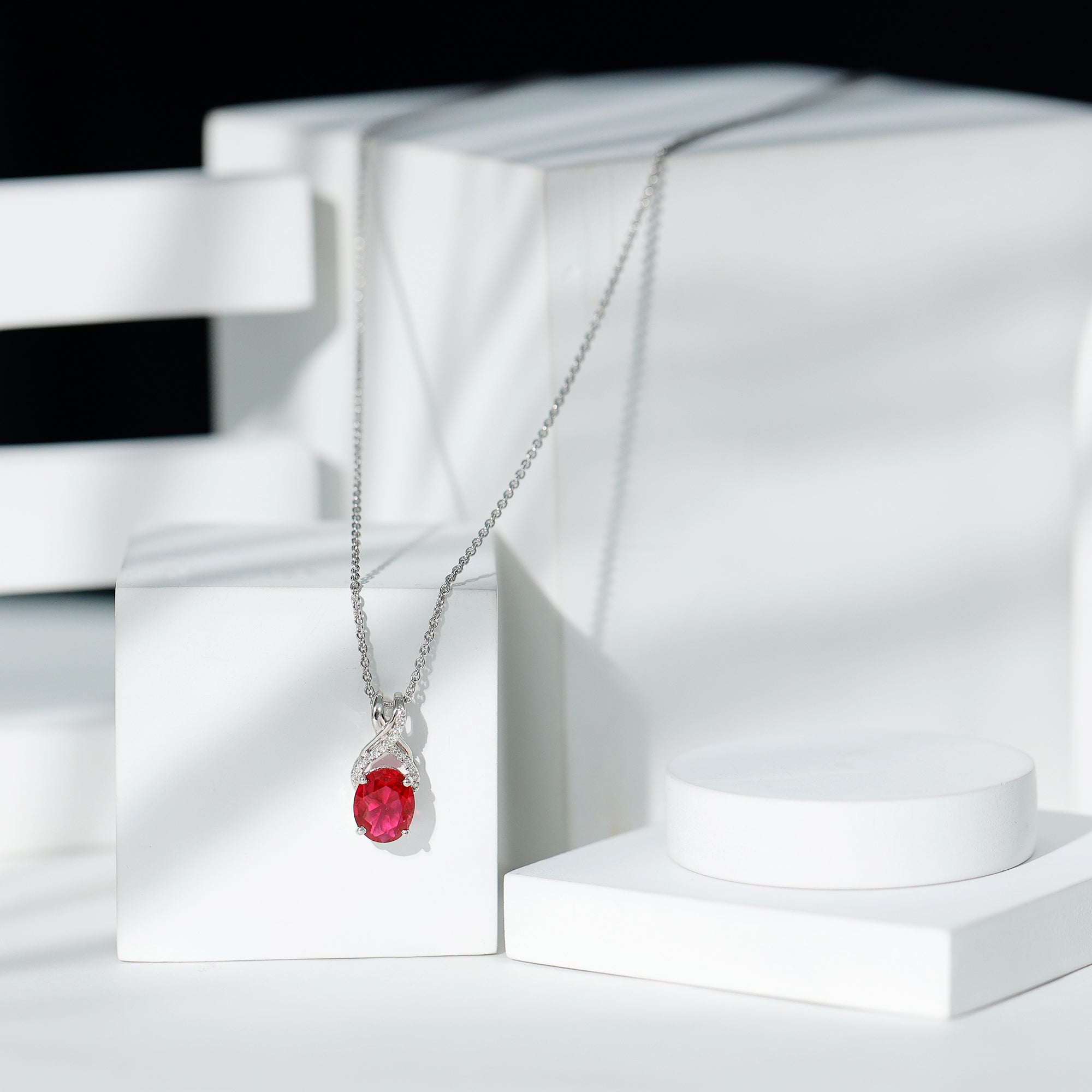 Designer Oval Created Ruby Solitaire Pendant with Diamond Twisted Bail