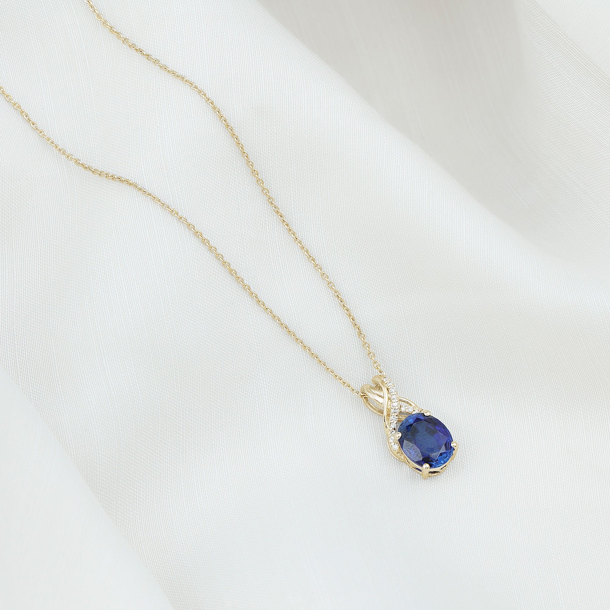 4 Carat Oval Lab Created Blue Sapphire Necklace with Diamond Twisted Bail