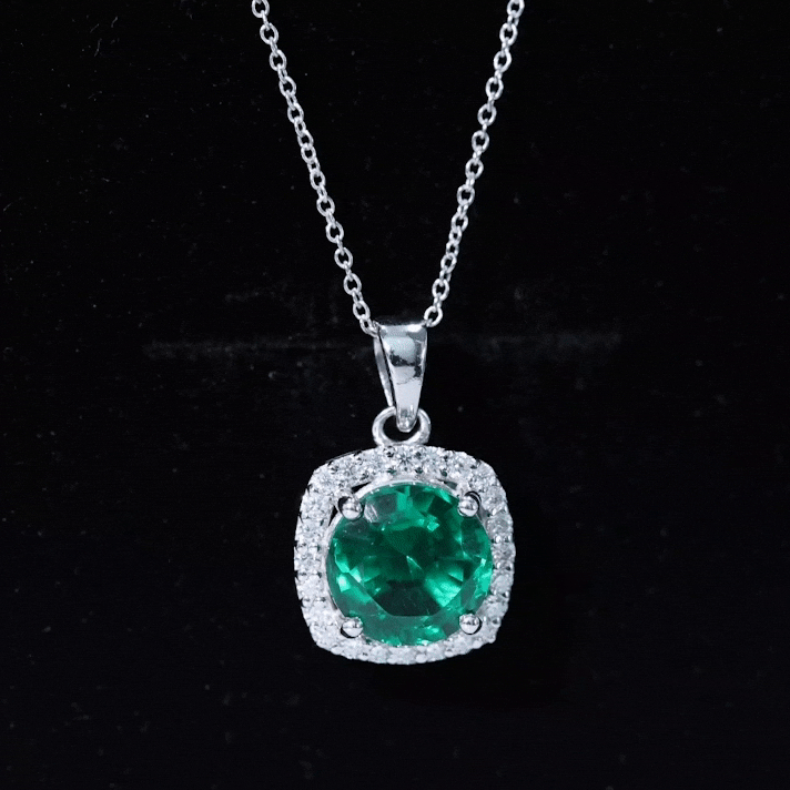 Lab Created Emerald and Moissanite Halo Pendant Necklace