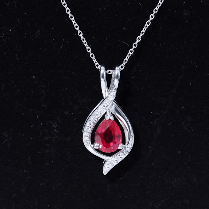 Pear Cut Created Ruby Teardrop Pendant with Moissanite Accent
