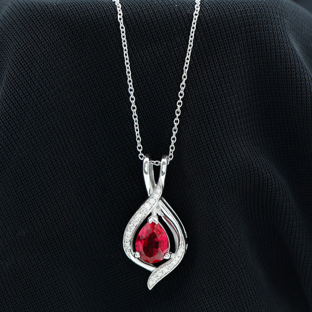 Pear Cut Created Ruby Teardrop Pendant with Moissanite Accent