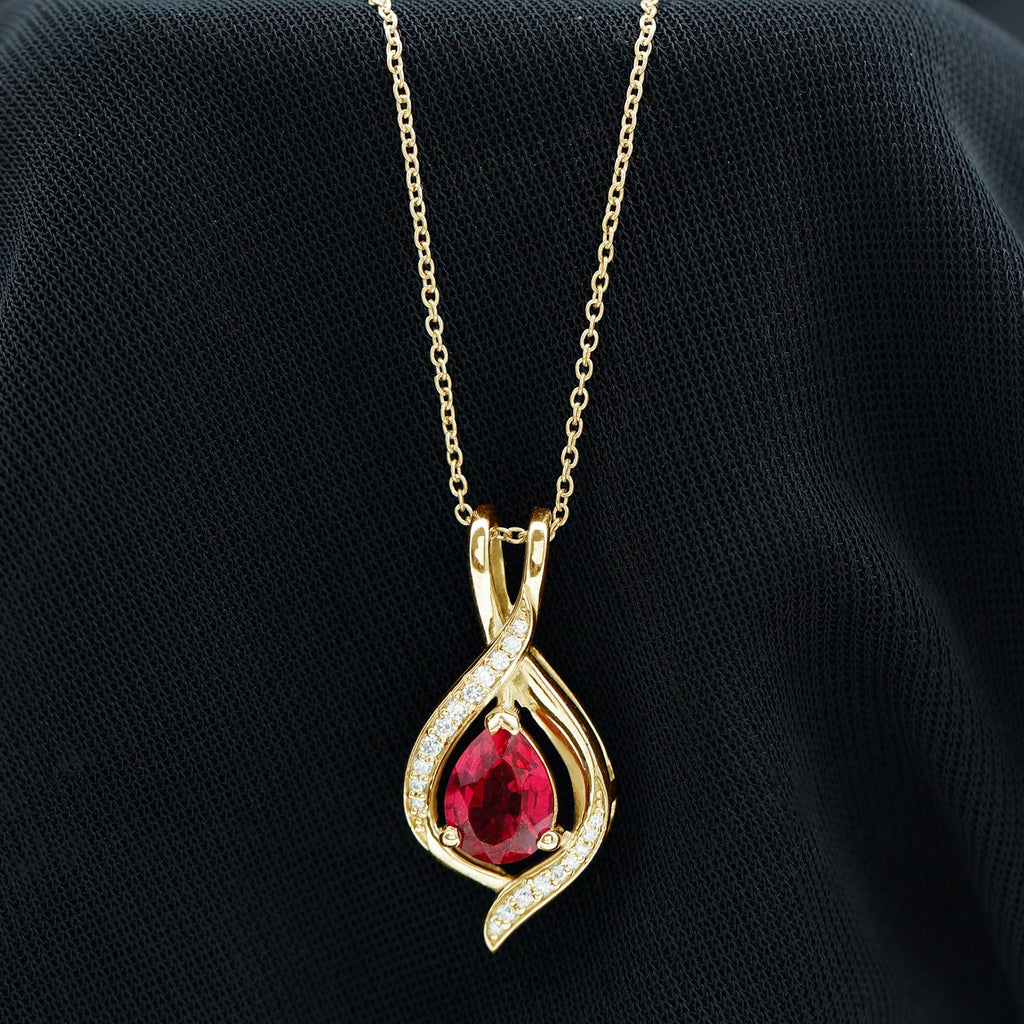 Pear Cut Created Ruby Teardrop Pendant with Moissanite Accent