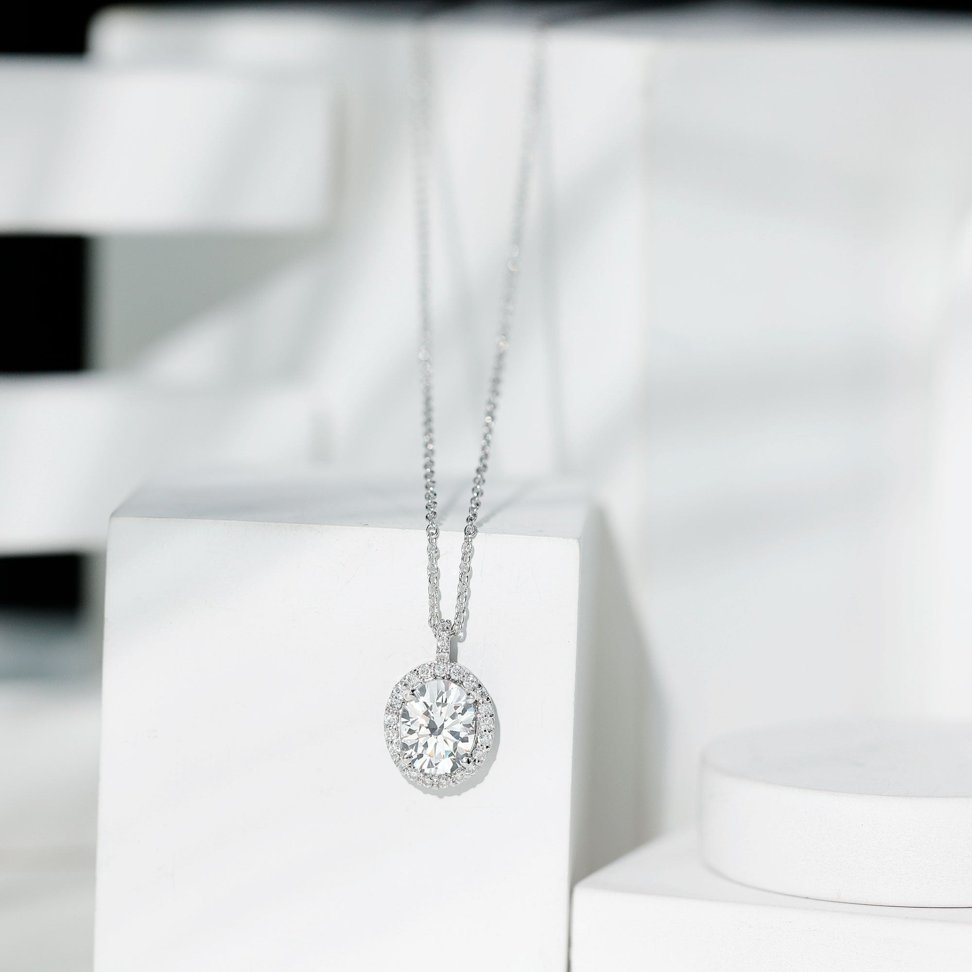 Oval Simulated Diamond Cocktail Halo Pendant