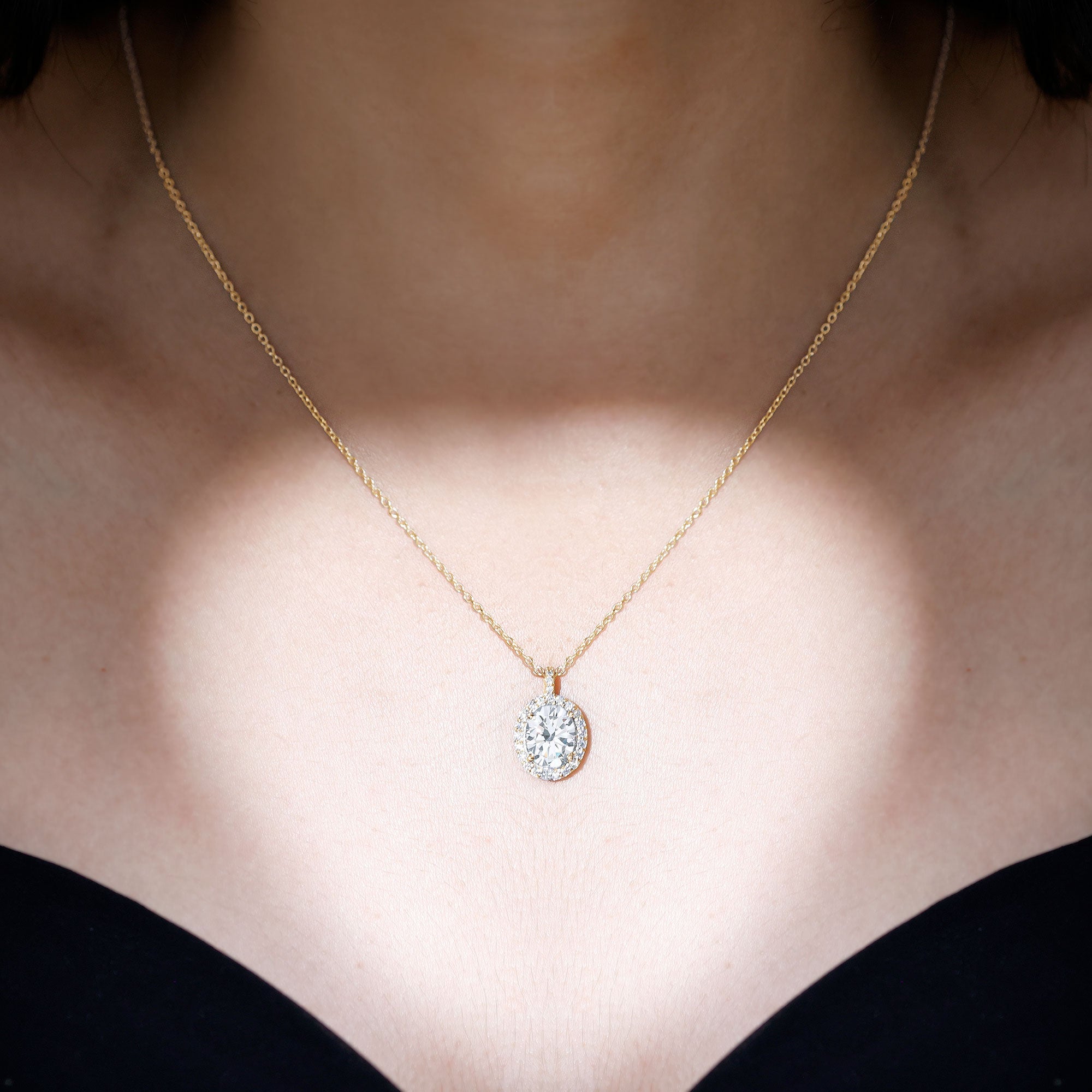 Oval Simulated Diamond Cocktail Halo Pendant