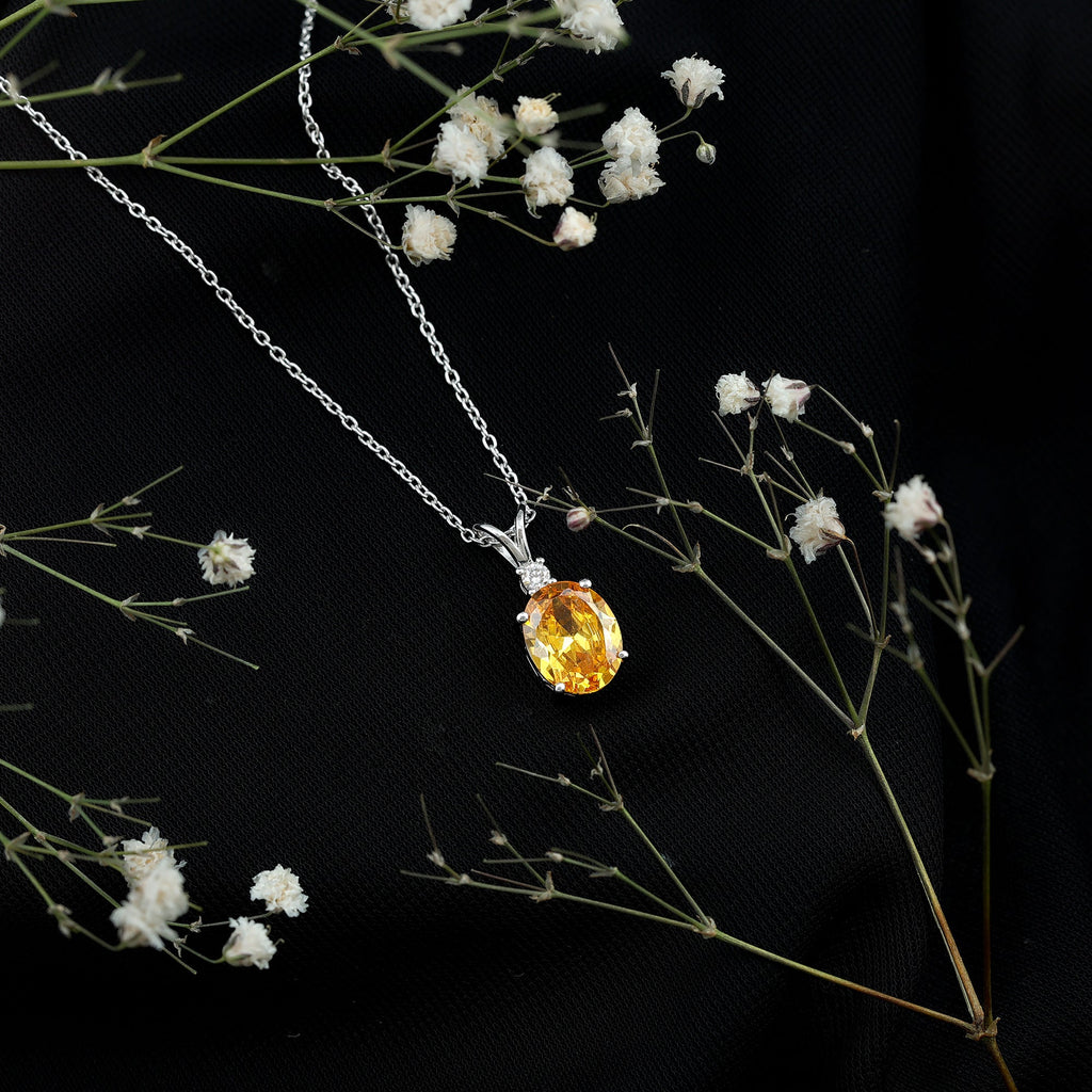 Oval Created Yellow Sapphire and Moissanite Solitaire Pendant