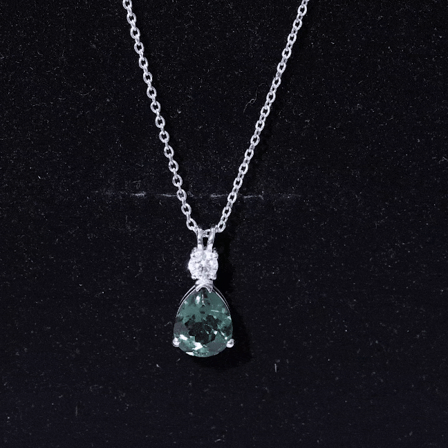 Pear Cut Created Green Sapphire Drop Pendant with Moissanite