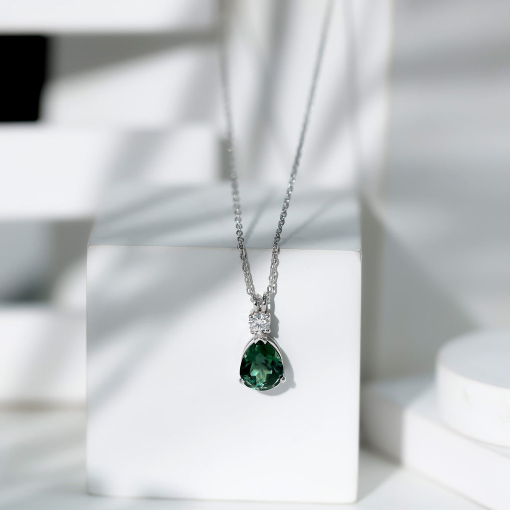 Pear Cut Created Green Sapphire Drop Pendant with Moissanite