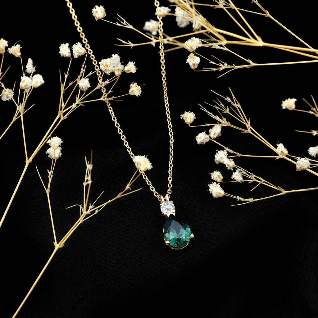 Pear Cut Created Green Sapphire Drop Pendant with Moissanite