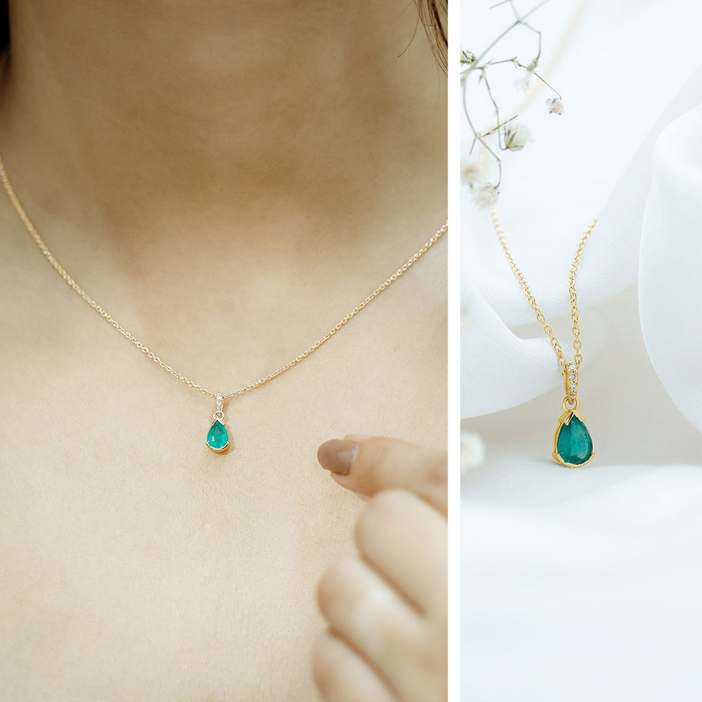 3/4 CT Pear Cut Emerald Solitaire Pendant in Half Bezel Setting with Diamond Accent Bail