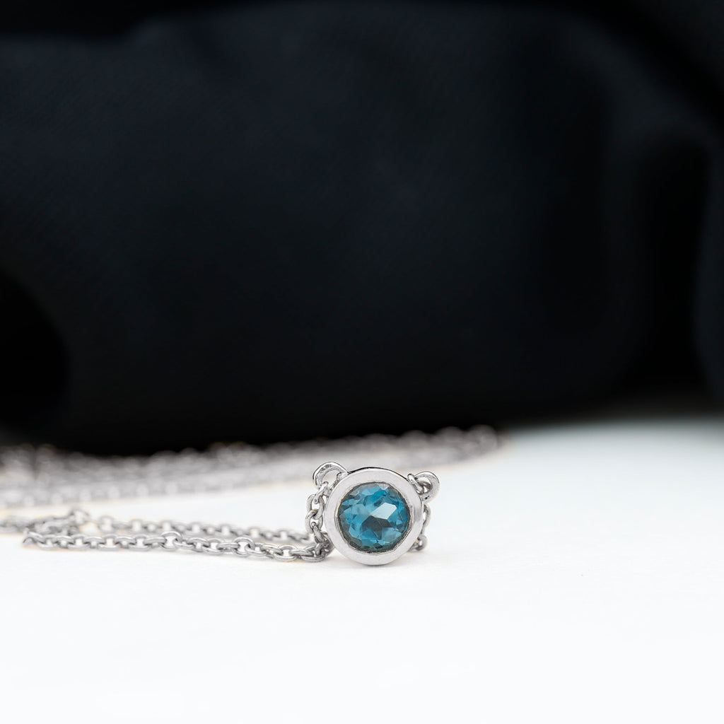 0.6 Carat Round London Blue Topaz Solitaire Necklace in Bezel Setting