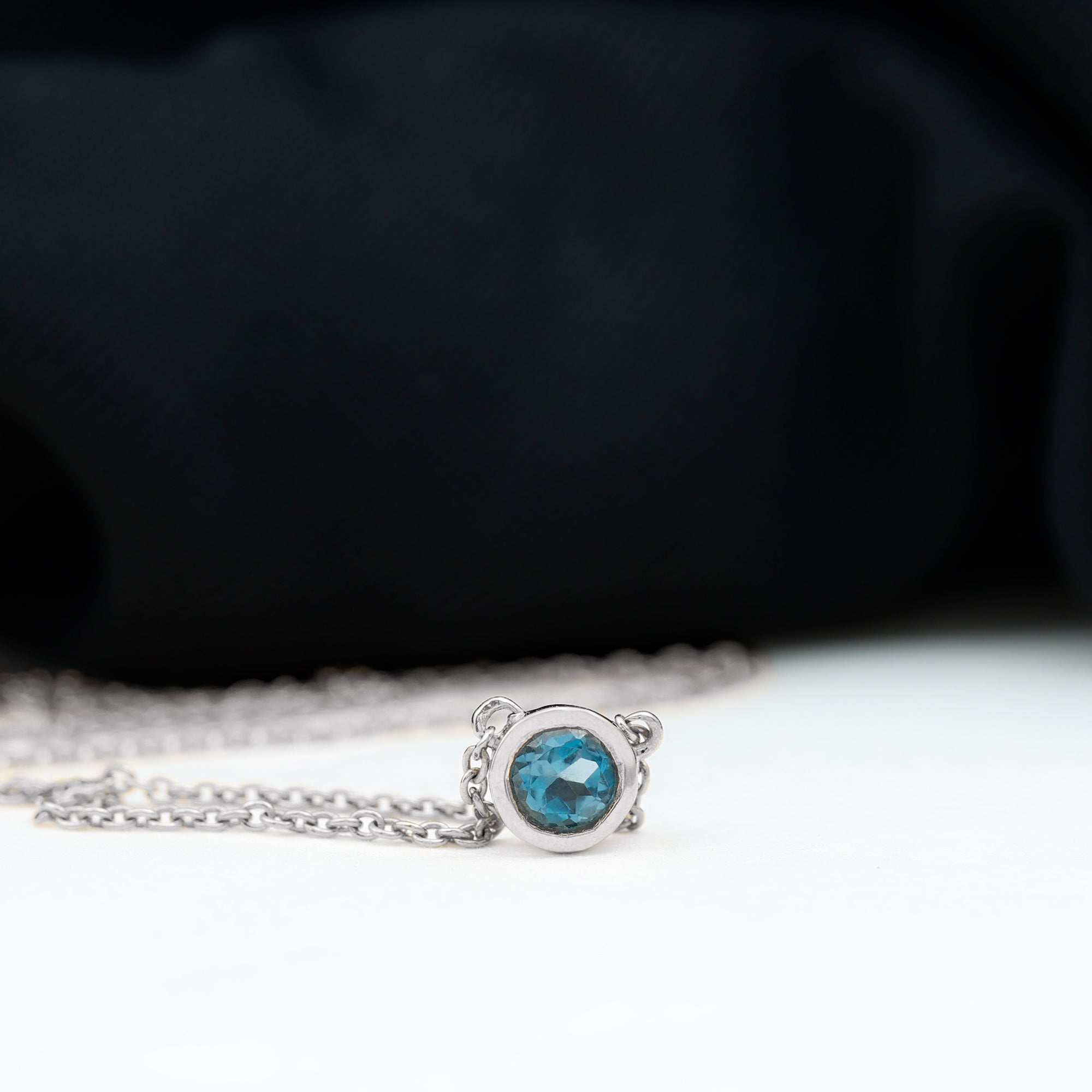 0.6 Carat Round London Blue Topaz Solitaire Necklace in Bezel Setting