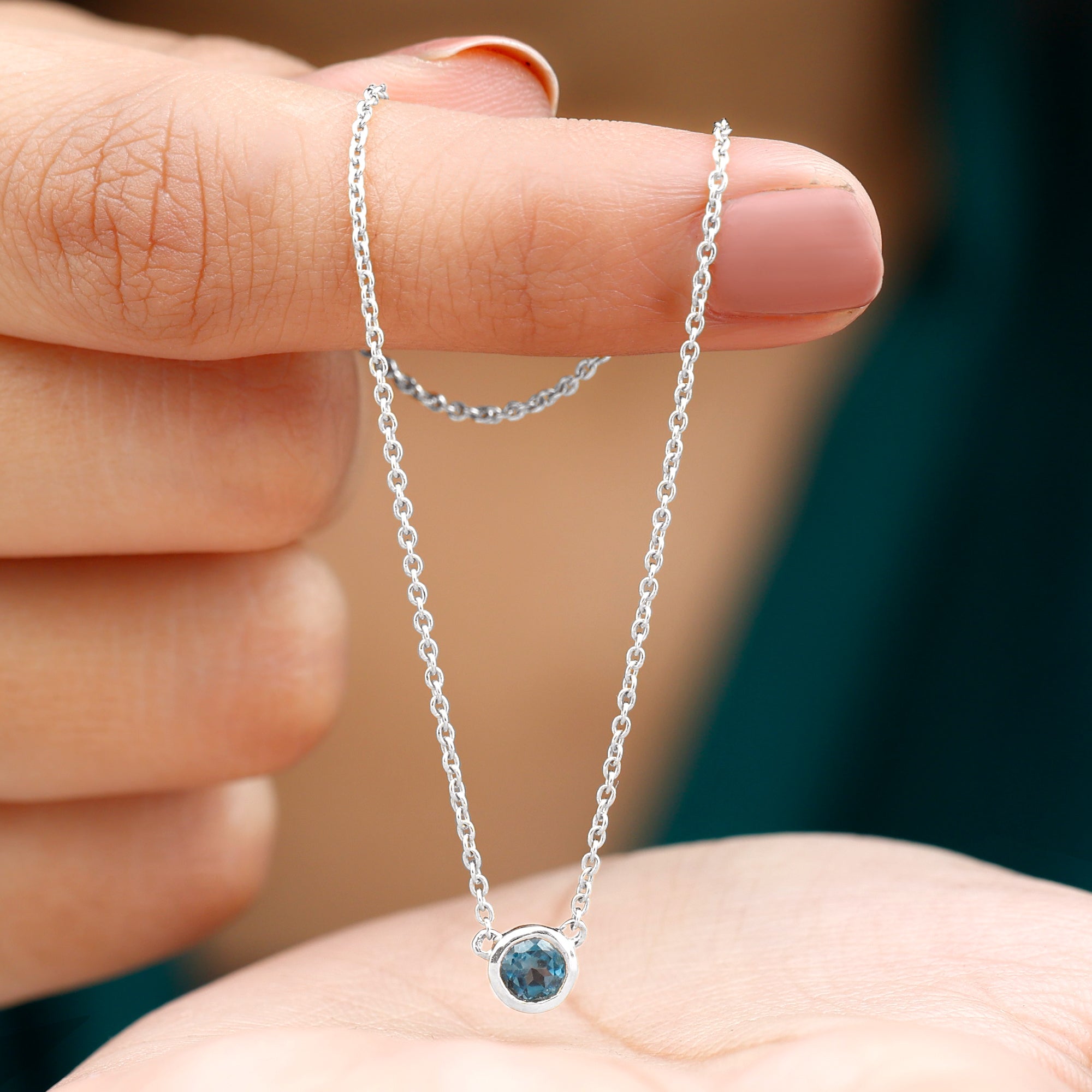 0.6 Carat Round London Blue Topaz Solitaire Necklace in Bezel Setting