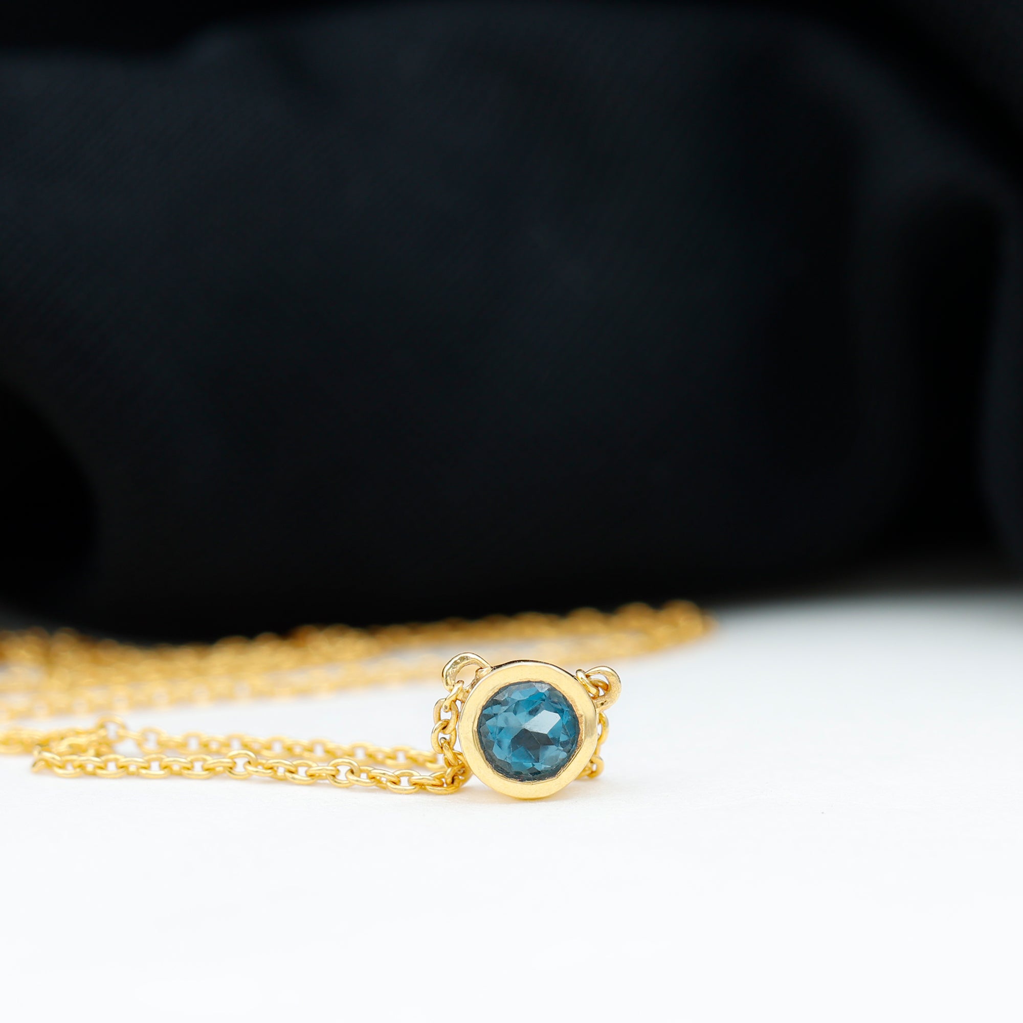 0.6 Carat Round London Blue Topaz Solitaire Necklace in Bezel Setting