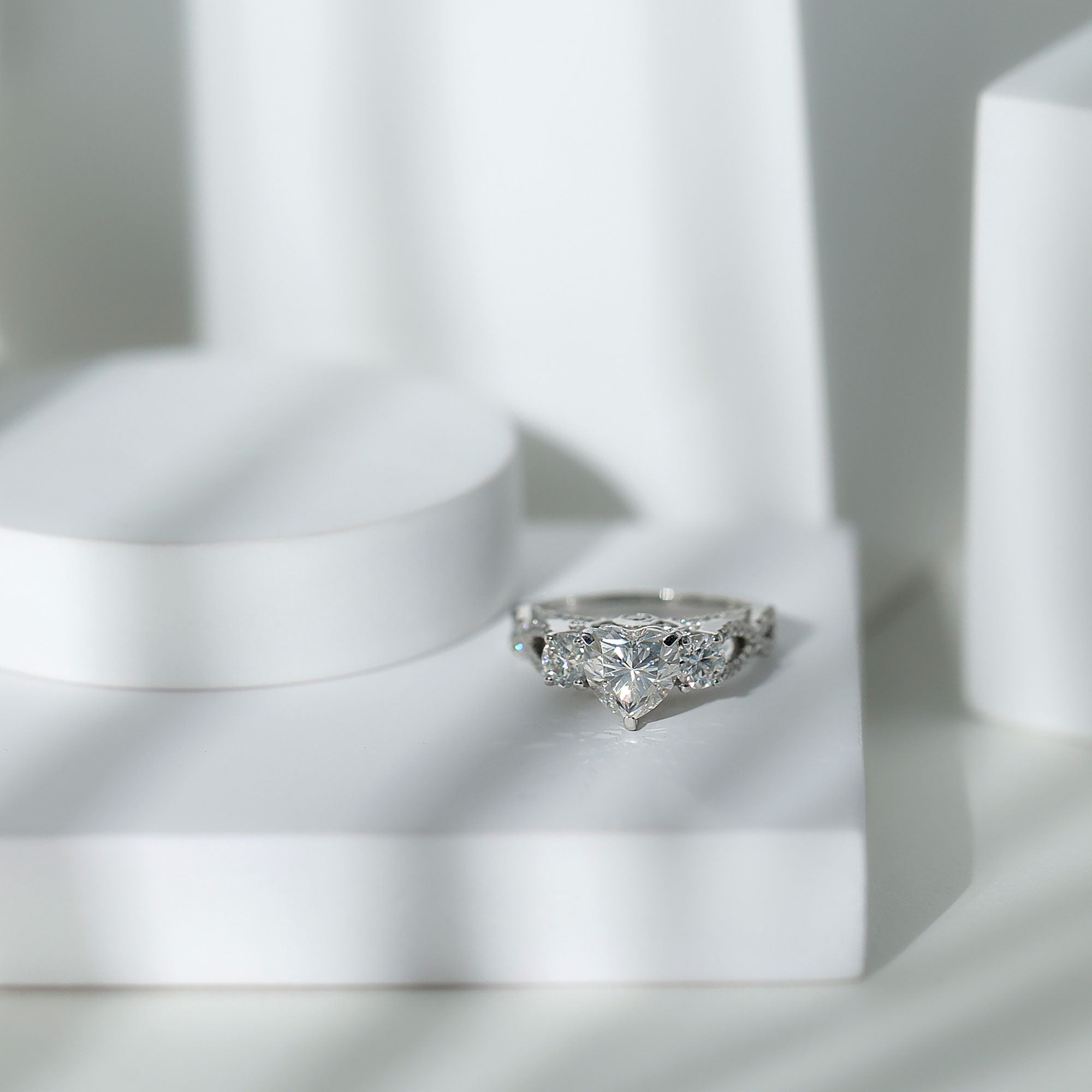 Heart Moissanite 3 Stone Engagement Ring in Crossover Band