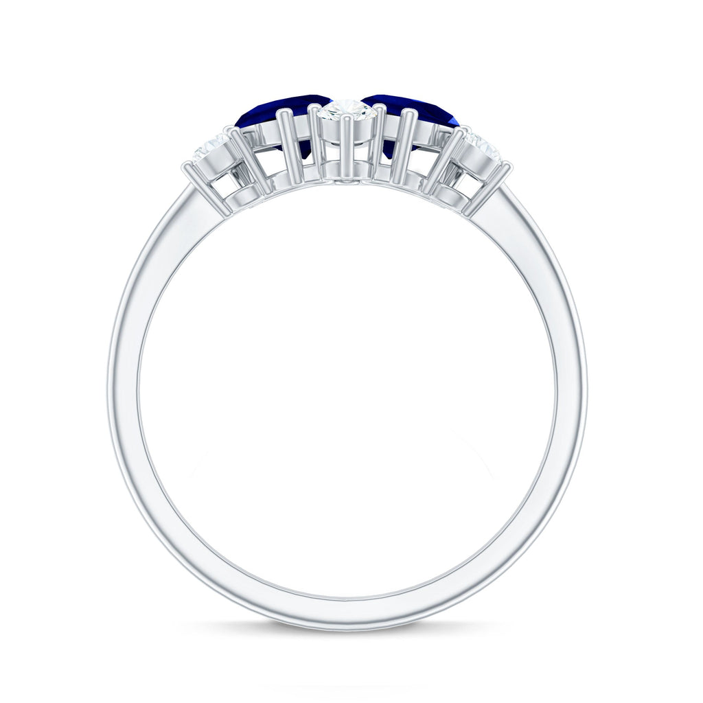 Lab Created Blue Sapphire and Diamond Cluster Ring