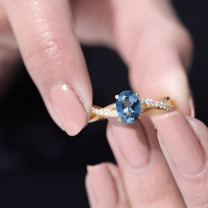 6X8mm Oval Cut London Blue Topaz Solitaire Engagement Ring with Diamond Spiral Shank