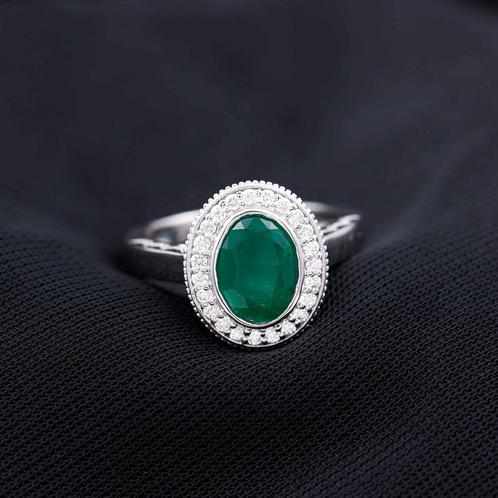 6X8 mm Oval Lab Grown Emerald Bezel Set Engagement Ring With Diamond Halo
