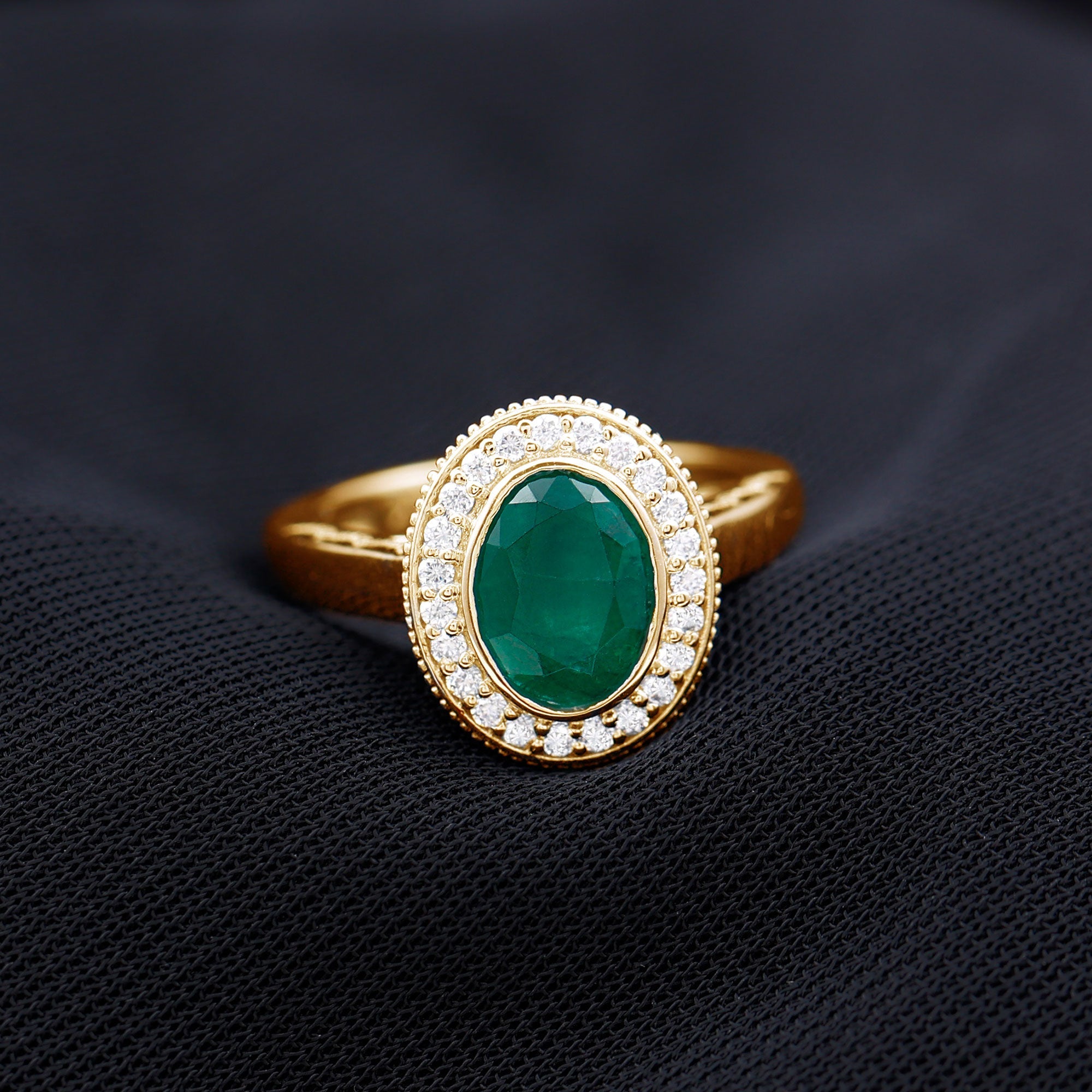 6X8 mm Oval Lab Grown Emerald Bezel Set Engagement Ring With Diamond Halo