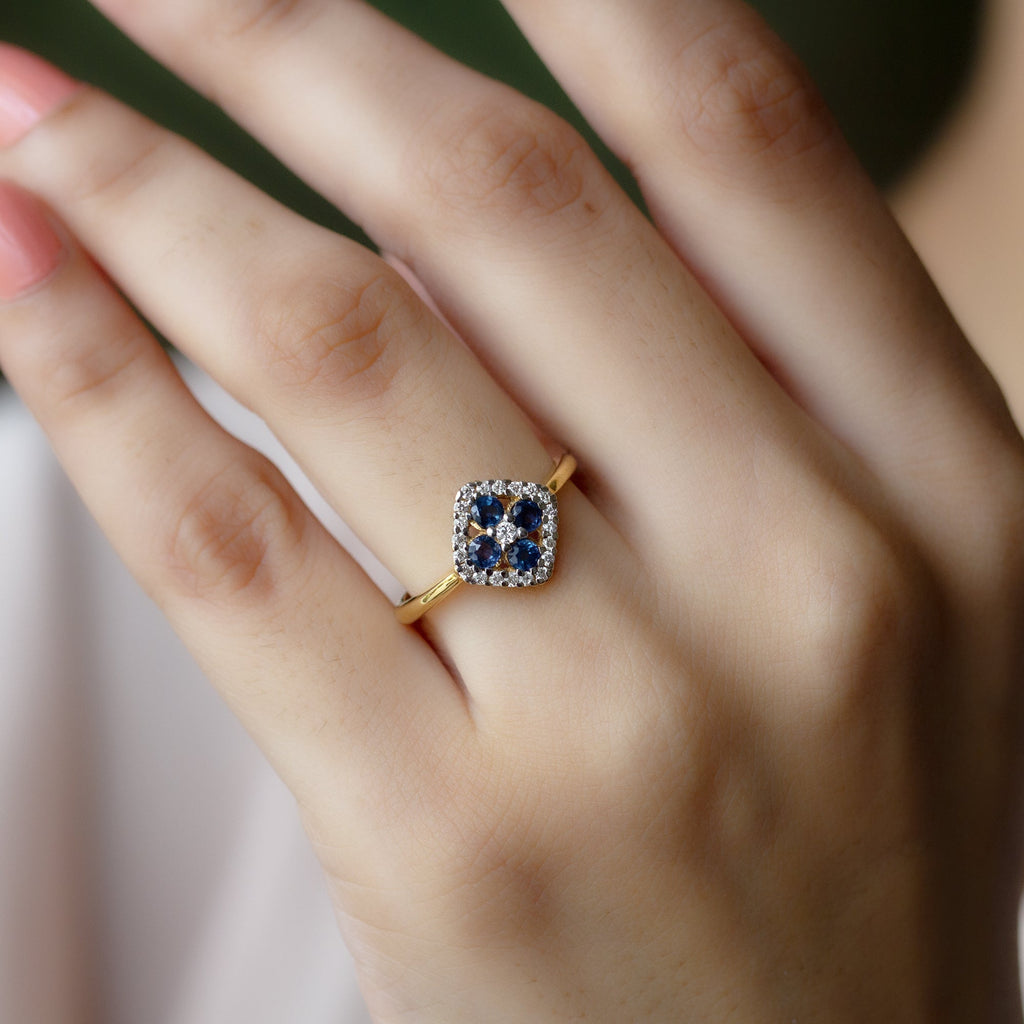 1/2 CT Blue Sapphire Cluster Ring with Diamond Accent