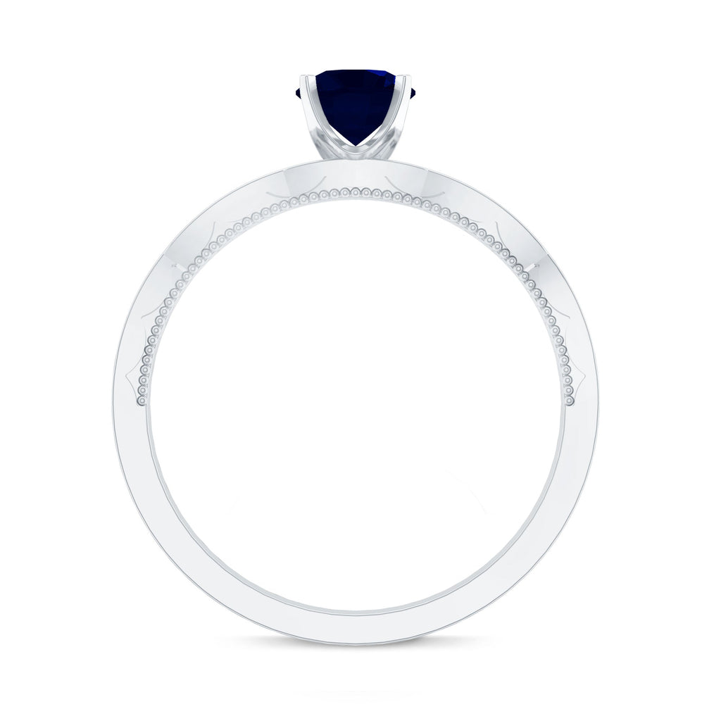 Blue Sapphire Solitaire Engagement Ring with Diamond Side Stones
